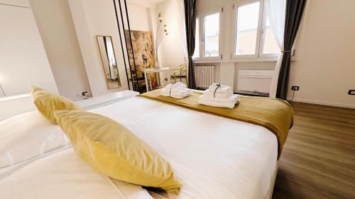 Ένα ή περισσότερα κρεβάτια σε δωμάτιο στο Truly Verona