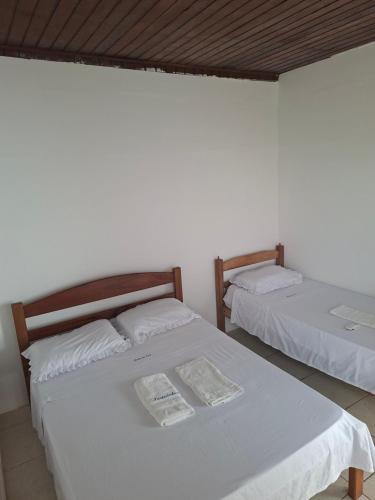 Postel nebo postele na pokoji v ubytování Hotel Porto da Lua Belém