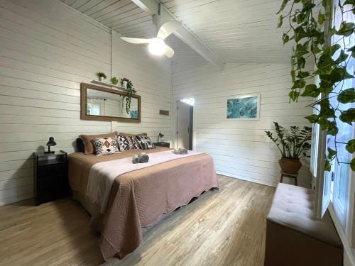 Postel nebo postele na pokoji v ubytování Oásis Completo no Centro com Piscina e Escritório