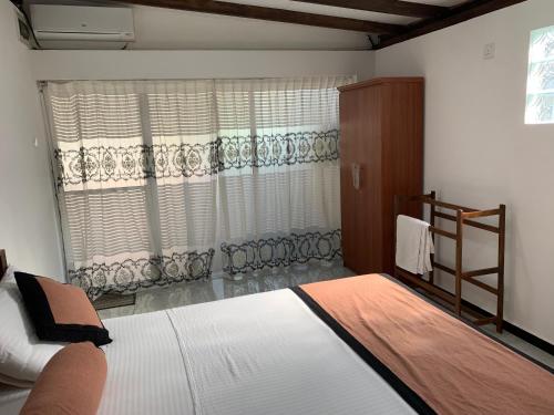 Кровать или кровати в номере Turtle Residence