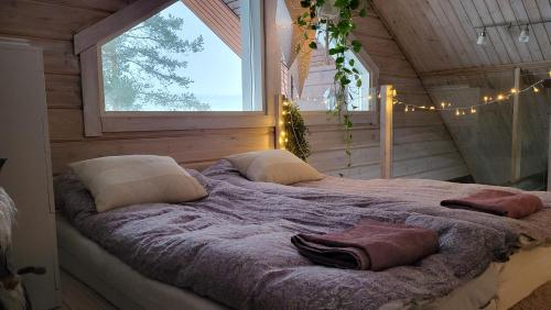 Postel nebo postele na pokoji v ubytování Villa Aihkiranta