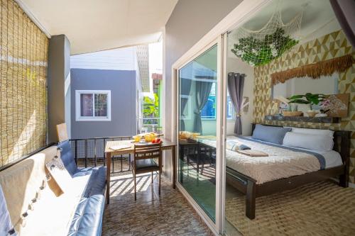 Postel nebo postele na pokoji v ubytování Tropical tiny house in fisherman s village