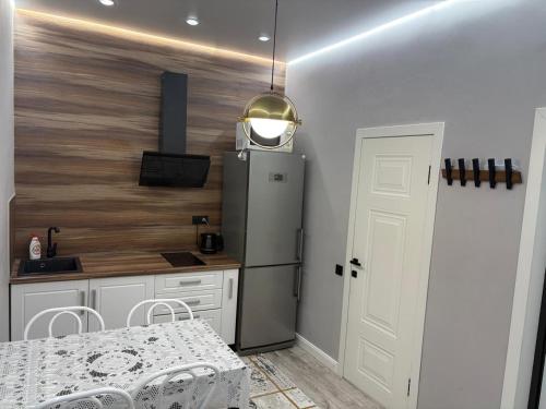 Kuchyň nebo kuchyňský kout v ubytování 24 home актау