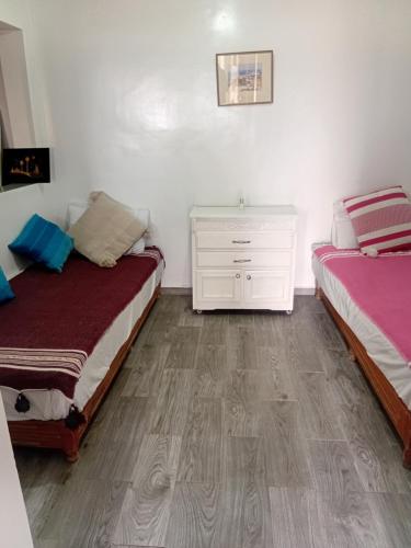 Ένα ή περισσότερα κρεβάτια σε δωμάτιο στο Maison Fatima