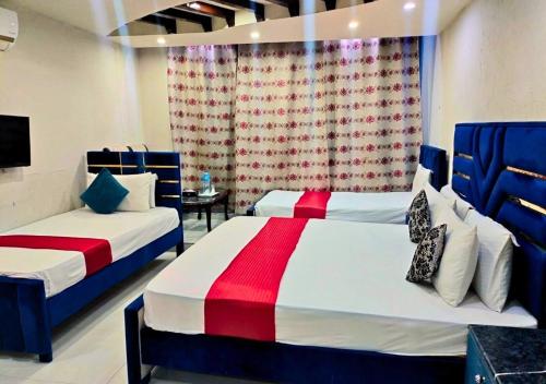 Una cama o camas en una habitación de Quick continental Hotel - Jail Road