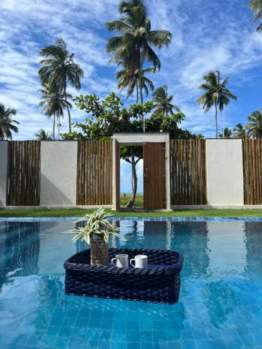 Swimmingpoolen hos eller tæt på Casa Mar dos Coqueirais