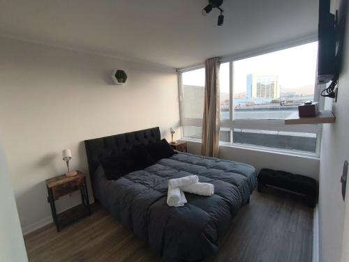 Ένα ή περισσότερα κρεβάτια σε δωμάτιο στο Oceana Suites Edifcio HA