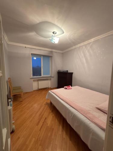 Ένα ή περισσότερα κρεβάτια σε δωμάτιο στο Doctor's House