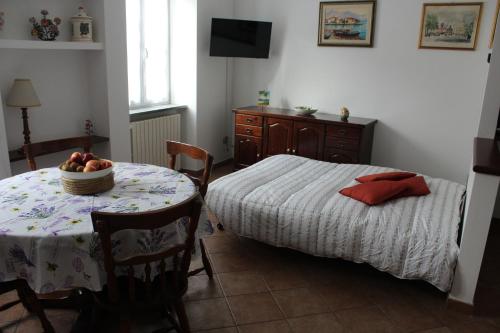 Postel nebo postele na pokoji v ubytování La Casetta