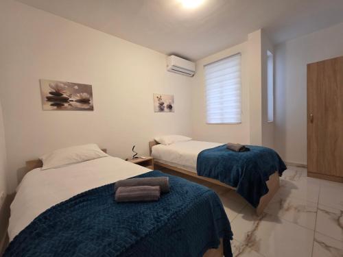 Ένα ή περισσότερα κρεβάτια σε δωμάτιο στο Il-Gawwija Suite Gozo