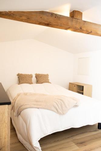 Postel nebo postele na pokoji v ubytování Loft La Sous Préf!