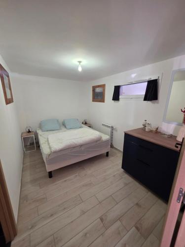 Postel nebo postele na pokoji v ubytování La Longeret du Bouchet Mont Charvin