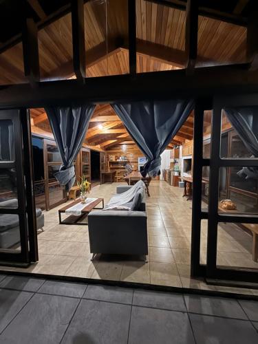a view of a living room with a couch at Luz de campo in Dos de Mayo