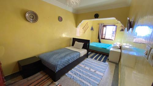 Cama o camas de una habitación en Gypsy Surf Maroc Hostel