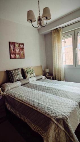 En eller flere senge i et værelse på Nice, classy apartment