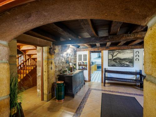 an entrance to a house with an archway at La Casa De Los Pedros in Villar