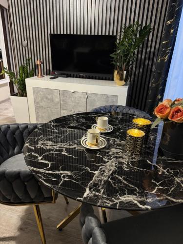 Posezení v ubytování Apartament- mieszkanie blisko centrum