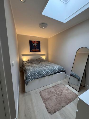 En eller flere senge i et værelse på Getferweg 50-2 City Appartement