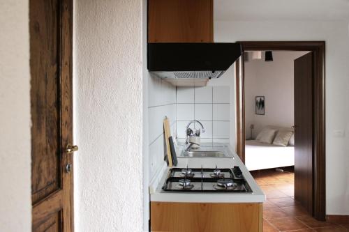 Η κουζίνα ή μικρή κουζίνα στο Lumira Vista - Borgo