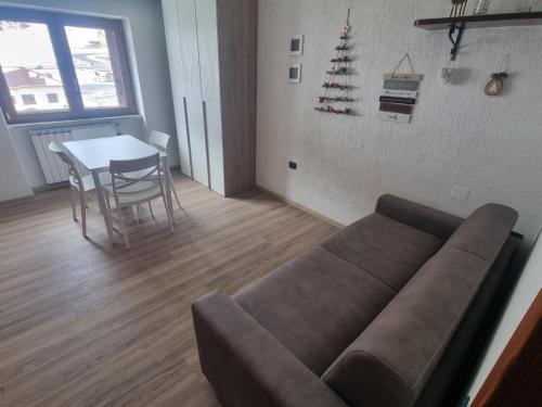 Et opholdsområde på Monolocale residence Paradiso Aremogna