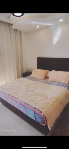 Una cama o camas en una habitación de Sharm Hills