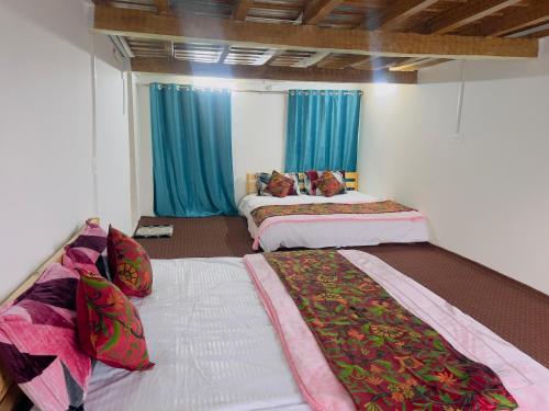 Postel nebo postele na pokoji v ubytování Mountain Majesty