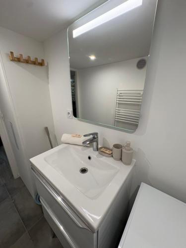 En eller flere senge i et værelse på Le Cosy de Croix-rousse