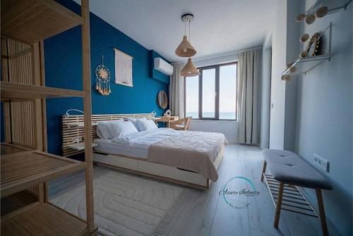 Postel nebo postele na pokoji v ubytování Azure Infinity - Sea view, Pools & SPA - Over the Sea and Under the Sky