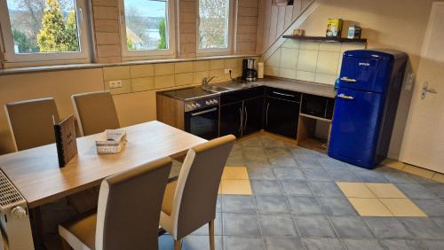 Кухня или мини-кухня в Ferienwohnung Ankerplatz
