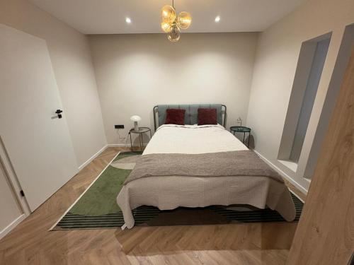 Ένα ή περισσότερα κρεβάτια σε δωμάτιο στο Hévíz Luxury by STN