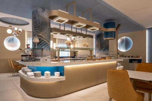 Coin salon dans l'établissement Hotel Villa Paola