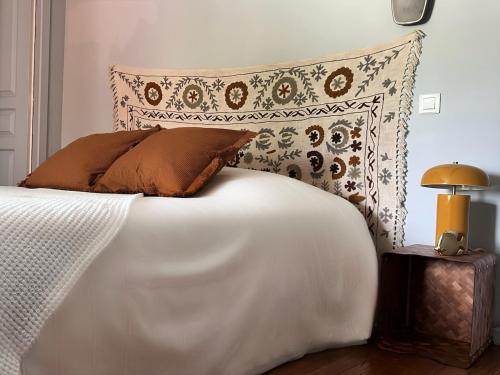 Petit mas familial ardéchoisにあるベッド