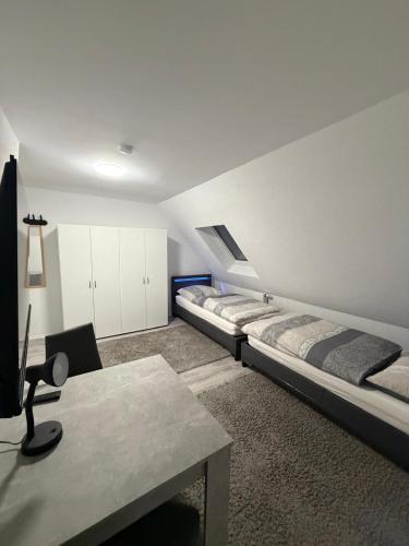 Postel nebo postele na pokoji v ubytování Fünf Täler Stern