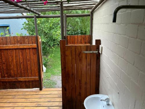 Ванная комната в Swallows Cottages