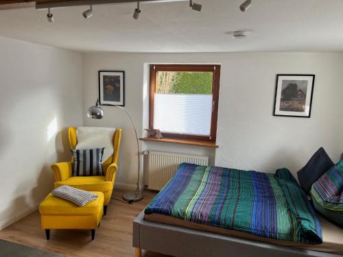 Ένα ή περισσότερα κρεβάτια σε δωμάτιο στο Schwarzwald-Nest Lenzkirch