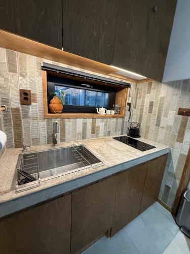 Kuchyň nebo kuchyňský kout v ubytování 이든이네