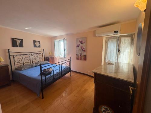 Ένα ή περισσότερα κρεβάτια σε δωμάτιο στο 4VENTI by LigurianLife