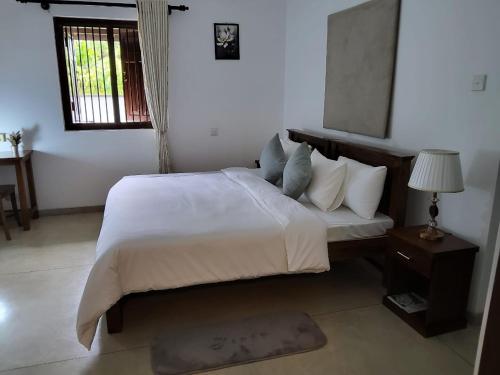 Una cama o camas en una habitación de Nest Villas