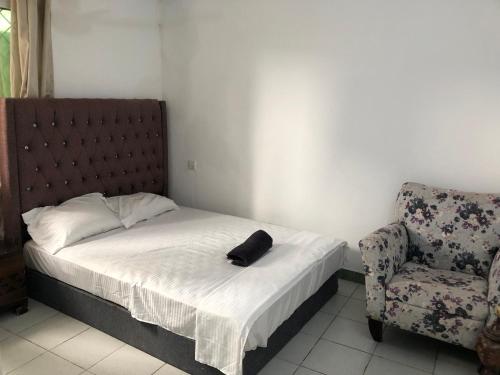 En eller flere senge i et værelse på Charming cottage near the beach