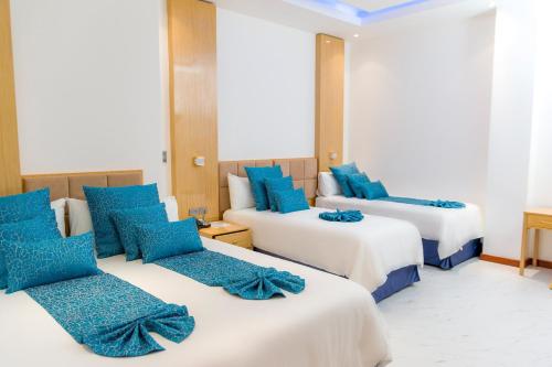 Ένα ή περισσότερα κρεβάτια σε δωμάτιο στο L'ver Hotel