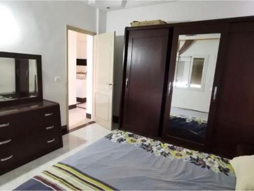 En eller flere senge i et værelse på La villa El RAIS