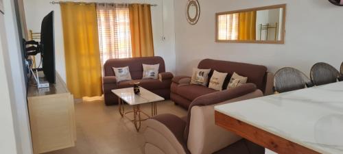 Χώρος καθιστικού στο Cosy Corner Apartment