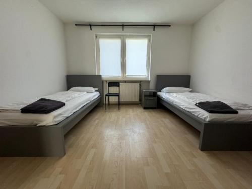 Ένα ή περισσότερα κρεβάτια σε δωμάτιο στο Tulpen Residenz