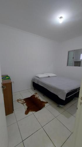 Postel nebo postele na pokoji v ubytování Casa térrea no centro ideal pra família e trabalho