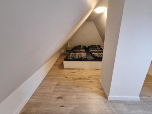 Ένα ή περισσότερα κρεβάτια σε δωμάτιο στο Ferienwohnung Heppenheim an der Bergstraße WHG 4