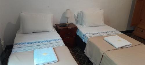 Ένα ή περισσότερα κρεβάτια σε δωμάτιο στο Atardecer en el Río