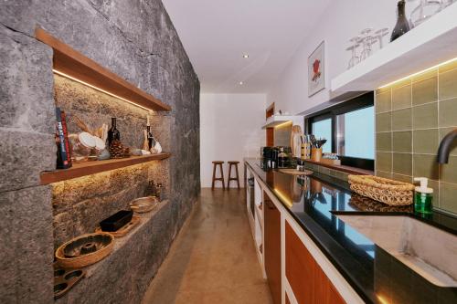 Kuchyň nebo kuchyňský kout v ubytování Casa del Aljibe - La Casa