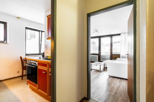 En eller flere senge i et værelse på Alpine Escape Cozy Retreat