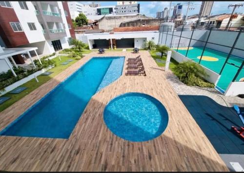 Swimmingpoolen hos eller tæt på Apartamento confortável 2 quartos, Piscina, Playground, Sauna em Belém