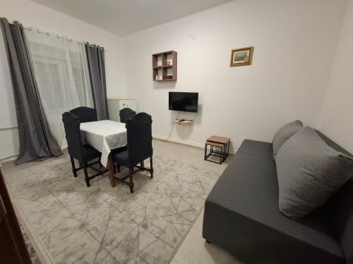 TV a/nebo společenská místnost v ubytování Paviljoni apartman